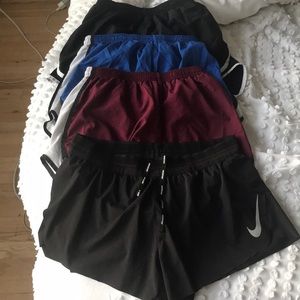 4 NIKE Running Shorts
